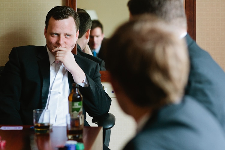 groom playing poker