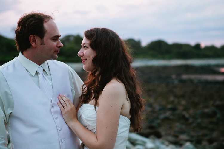 bride and groom at dusk at the Seacost Science Center