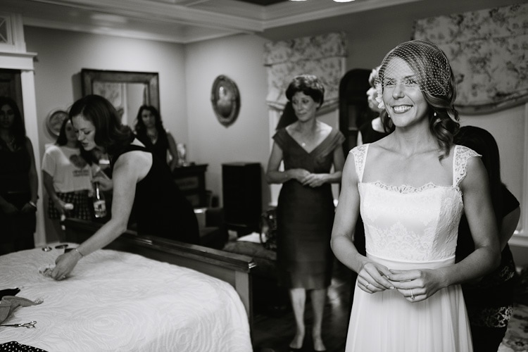 bride getting ready for her backyard wedding in Walpole