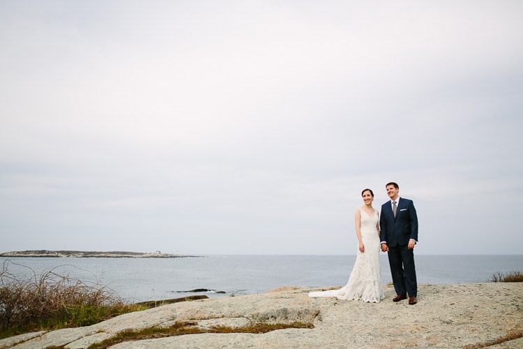 bride and groom with ocean