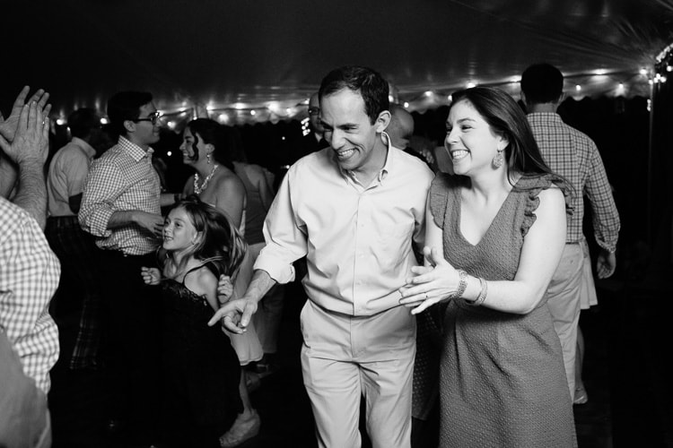 candid of guests dancing at a wedding