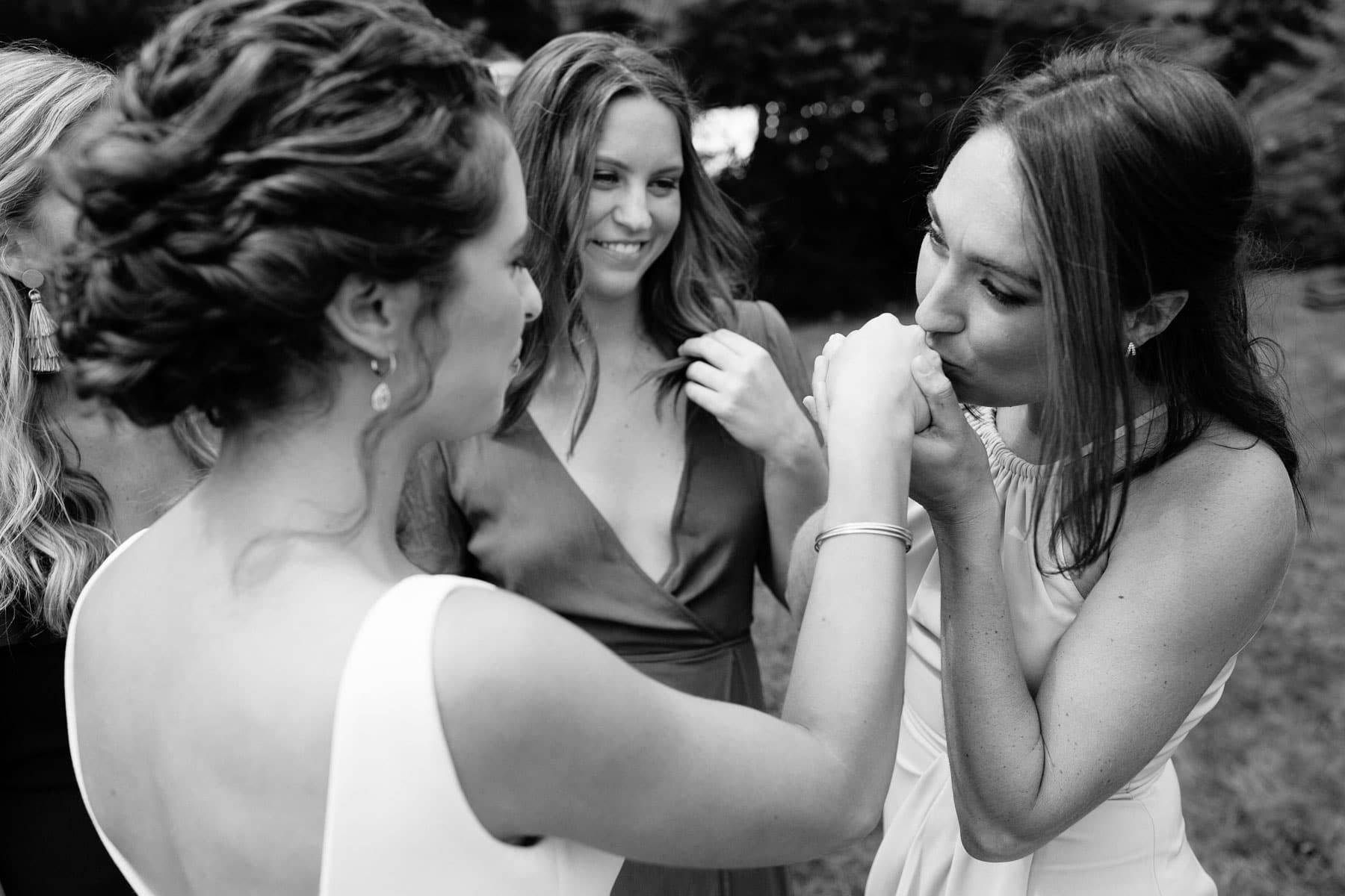 candid moment between bride and friends at Misselwood wedding | Kelly Benvenuto Photography | Boston wedding photographer