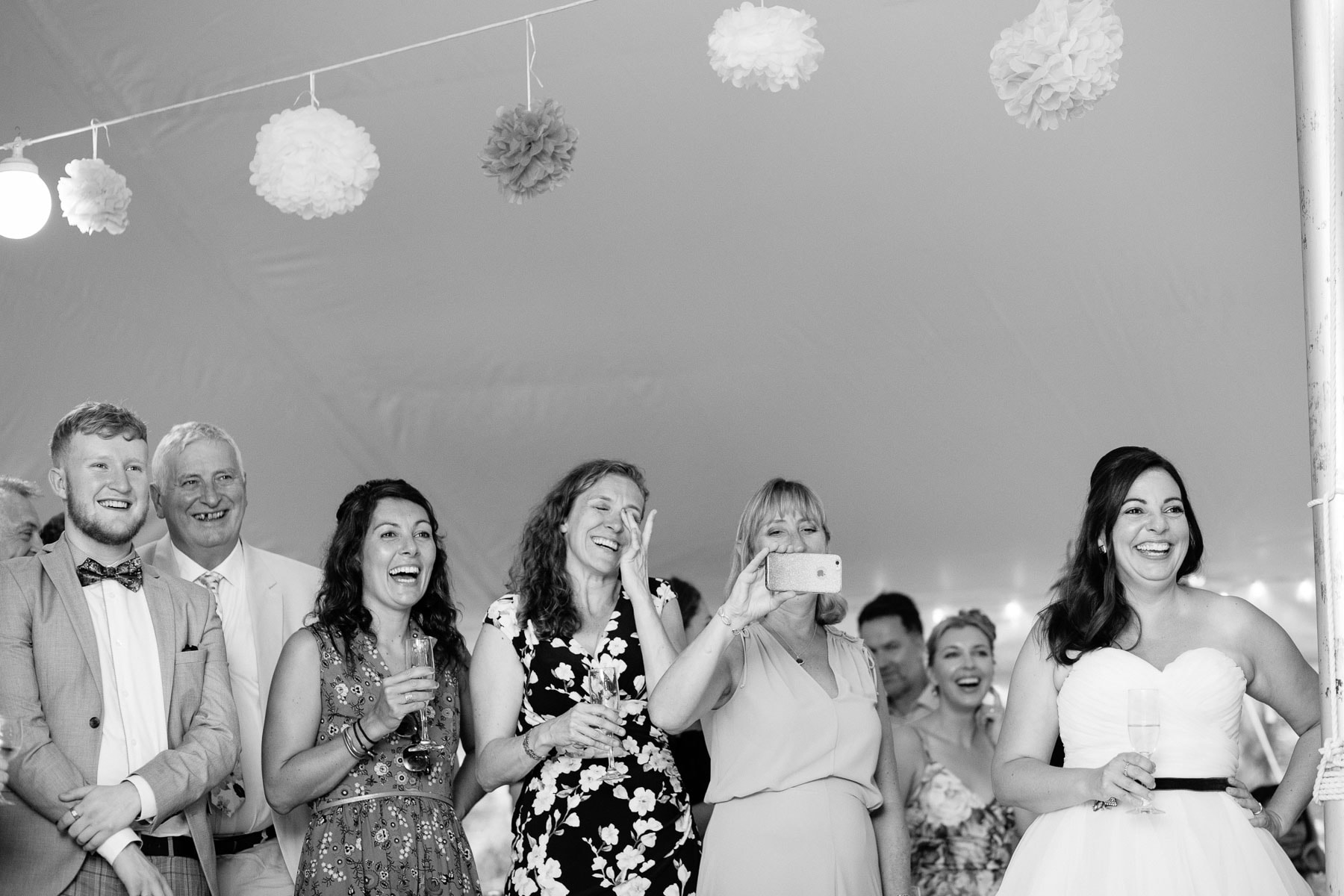 toasts during a tented wedding reception in Northampton MA | Kelly Benvenuto Photography