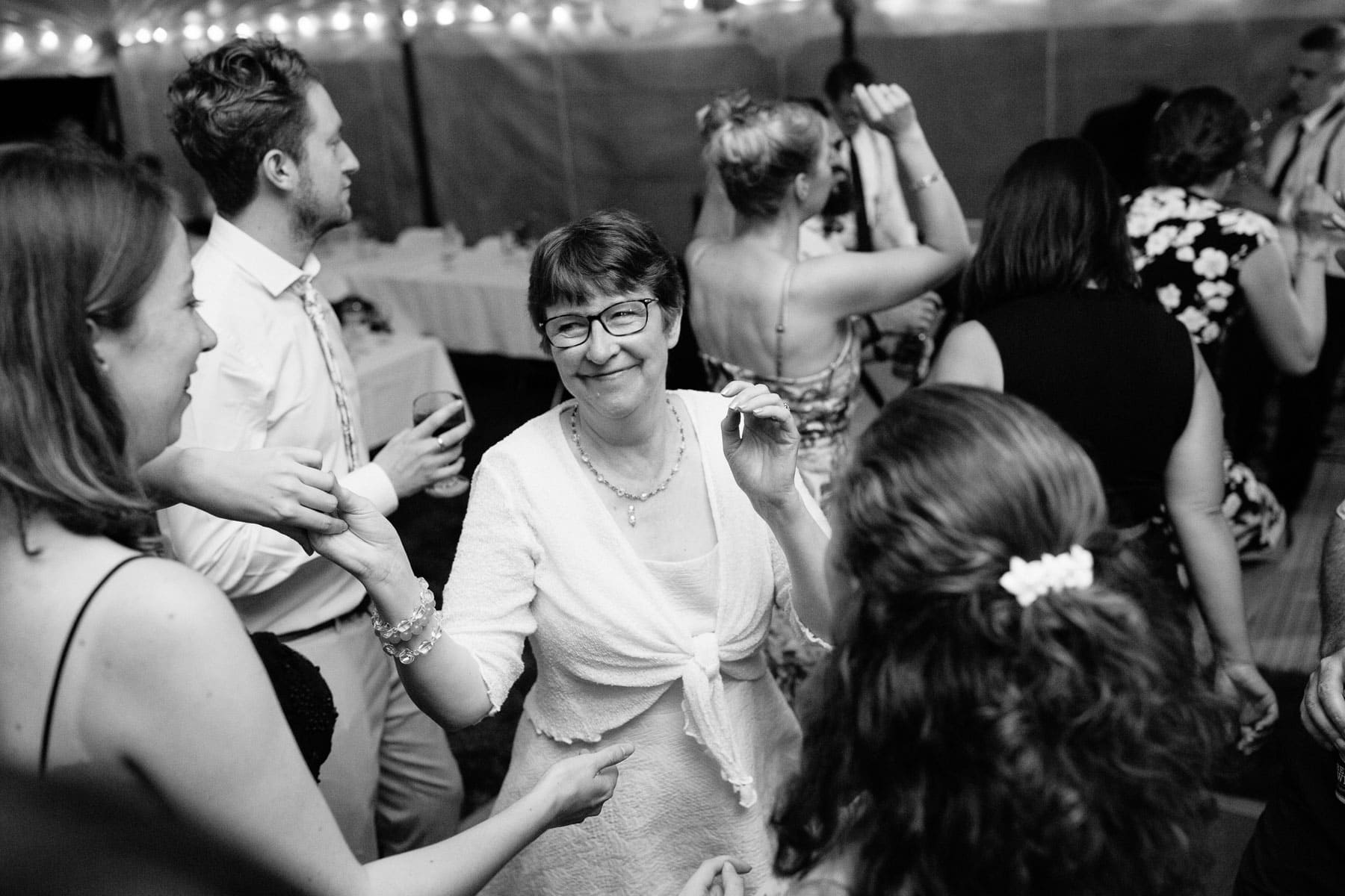 dancing at a tented wedding reception | Kelly Benvenuto Photography