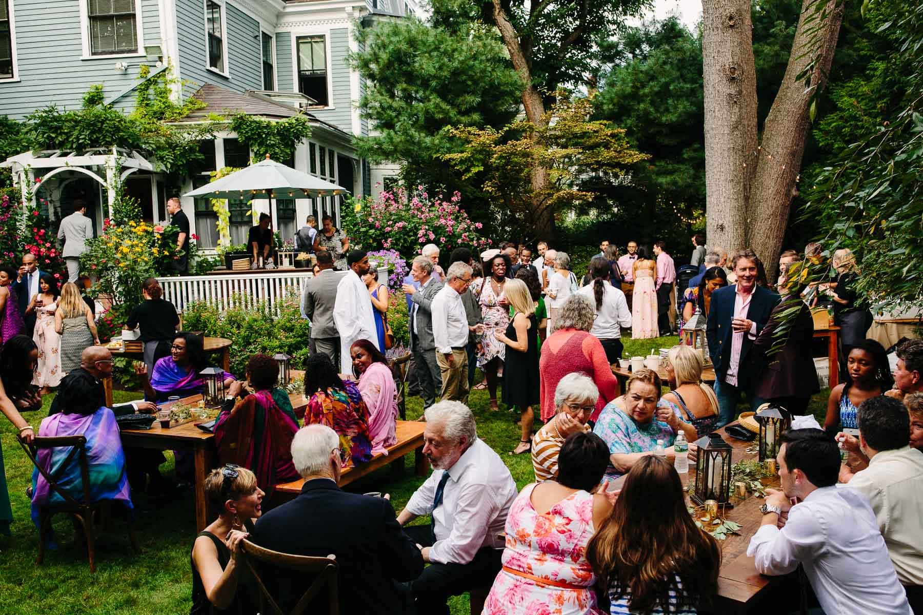 guests at a backyard Cambridge wedding | Kelly Benvenuto Photography