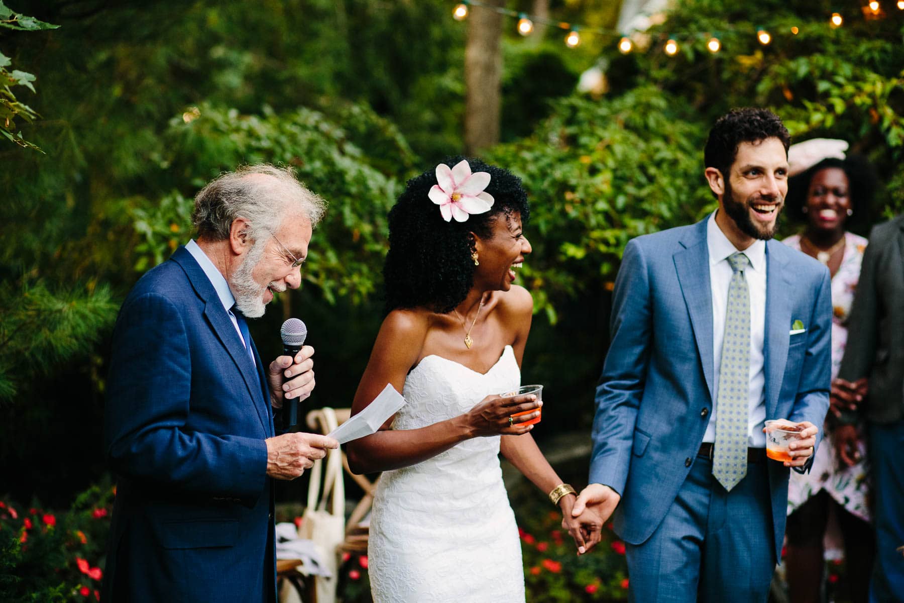 toasts in the backyard at a Cambridge wedding | Kelly Benvenuto Photography