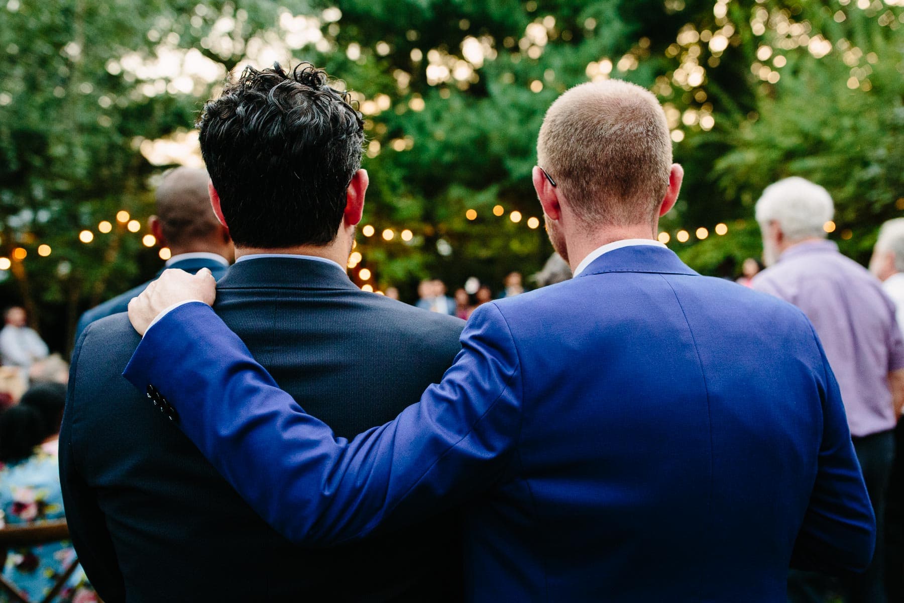 guests listen to toasts at a backyard wedding in Cambridge, MA | Kelly Benvenuto Photography