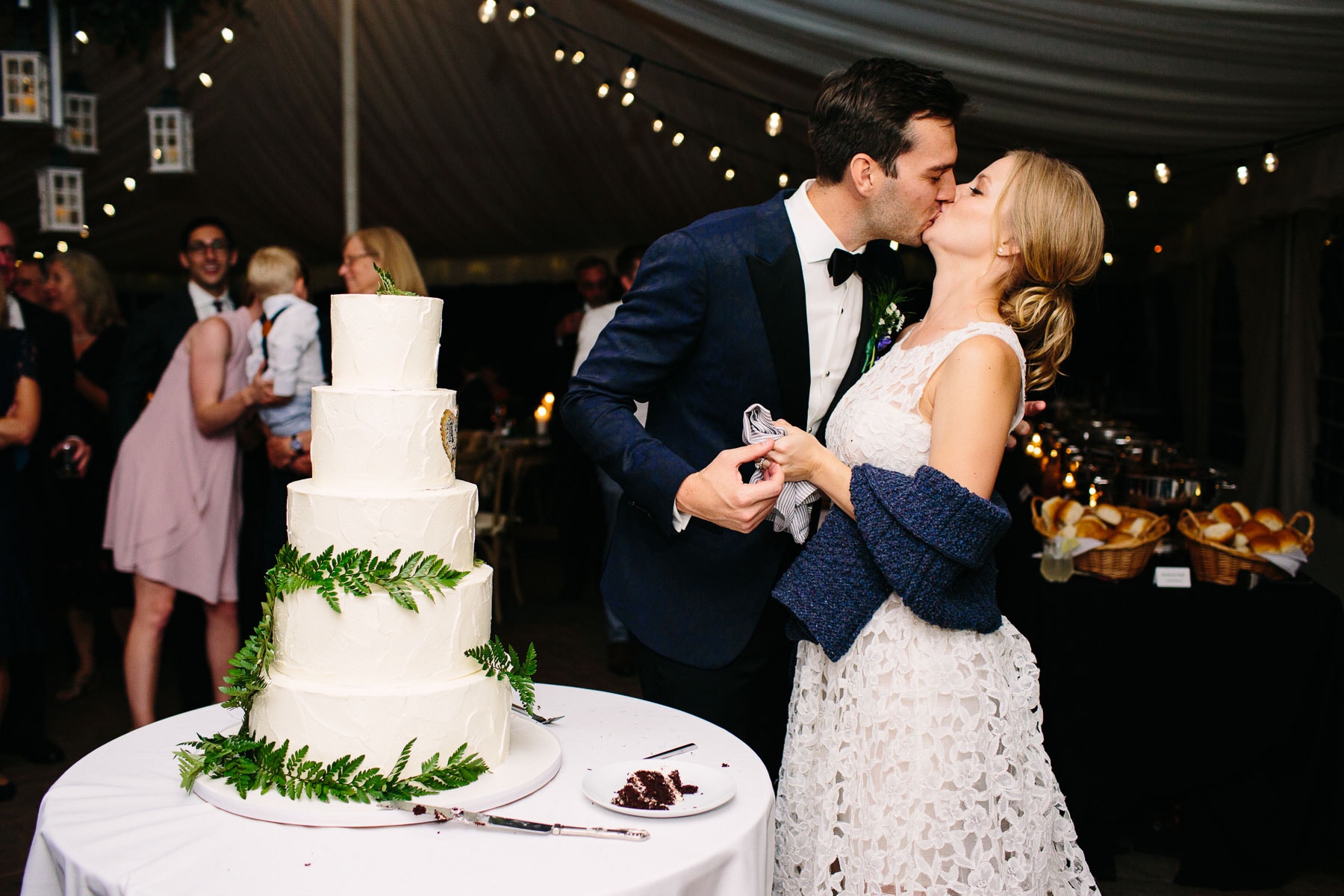 cake cutting at a Commander's Mansion wedding | Kelly Benvenuto Photography