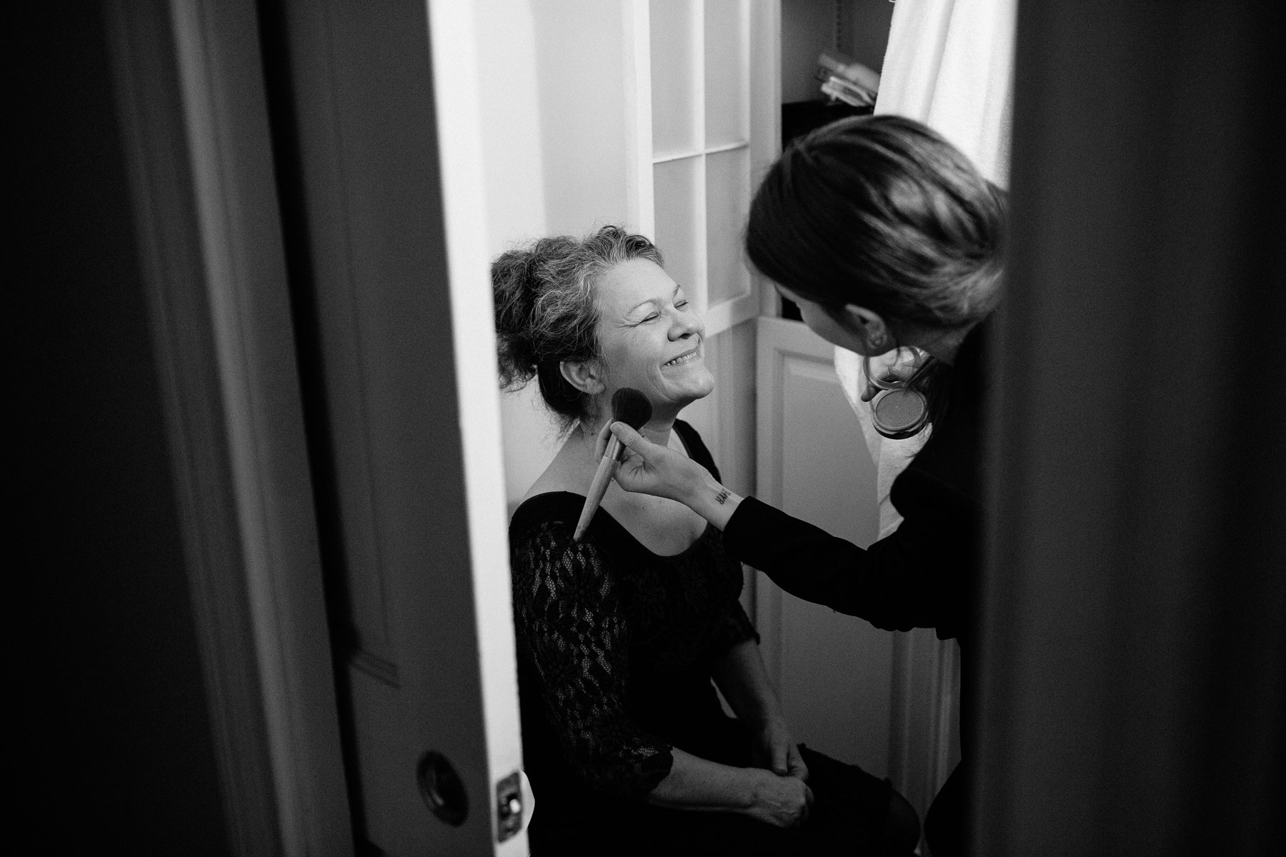 mother of the bride gets her makeup done
