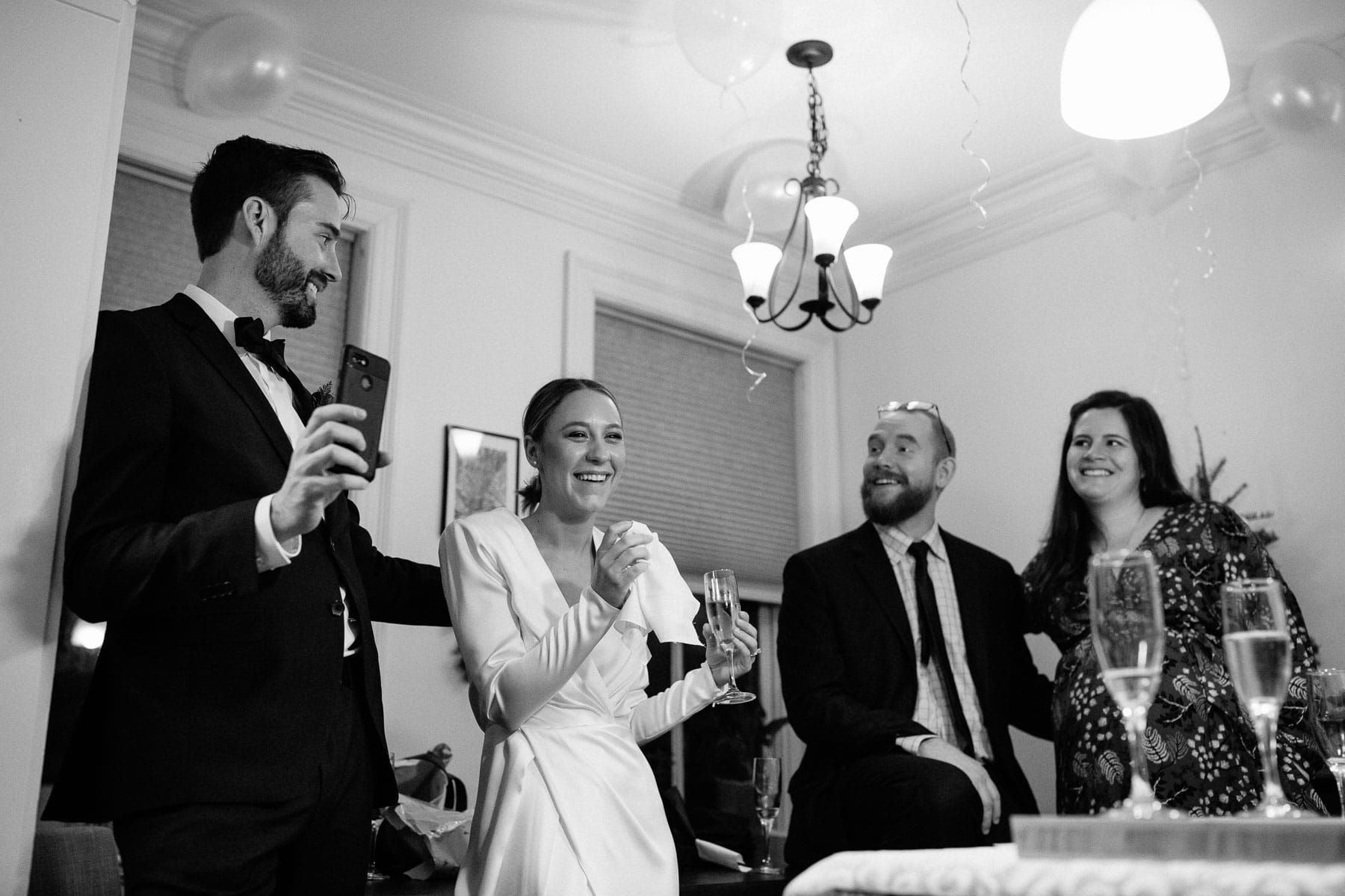 wedding toasts in the kitchen | boston wedding photojournalist