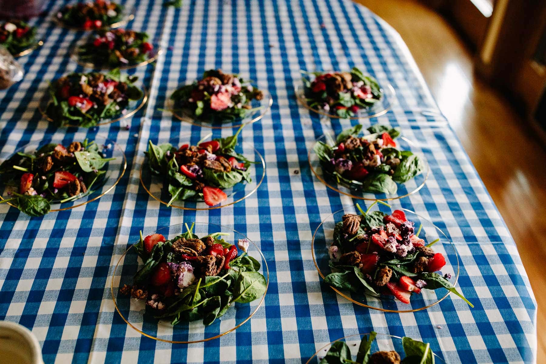 salads on blue gingham tablecloth