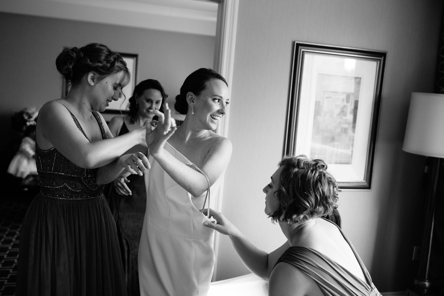 bride getting ready at the Hotel Marlowe in Cambridge