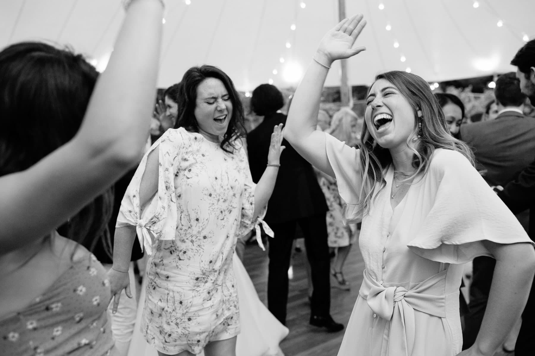 guests dancing at backyard tented wedding in CT