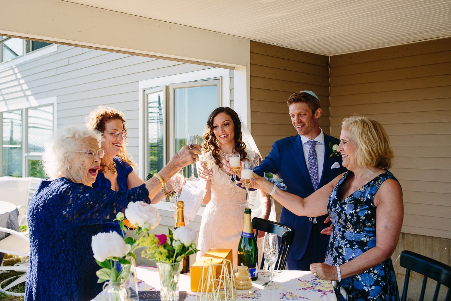a toast at tiny 2020 wedding