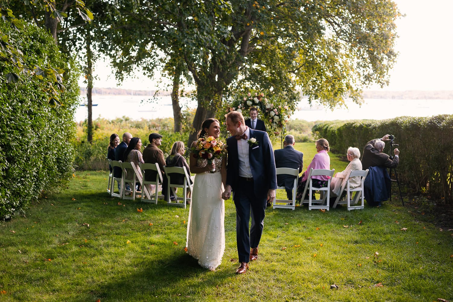 bride and groom recess from their backyard Mattapoisett wedding
